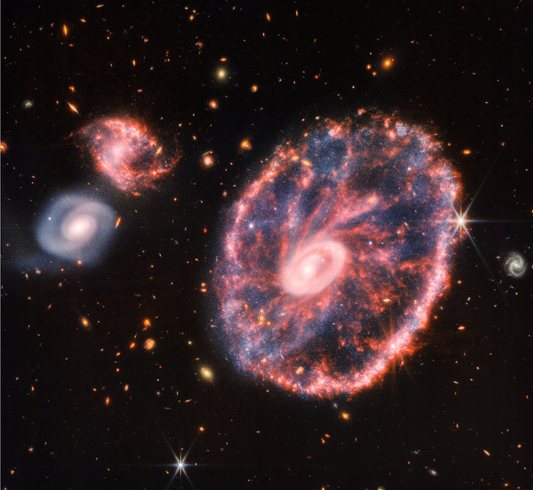 Webb Telescope Captures Star Nursery Impaled In Galactic Hit & Run